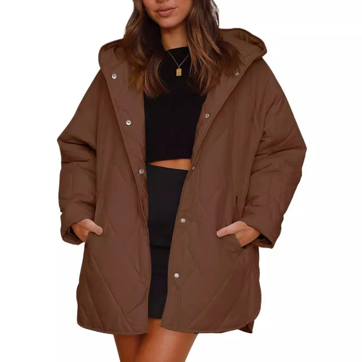 Corvaya™ – oversize-talvitakki hupulla