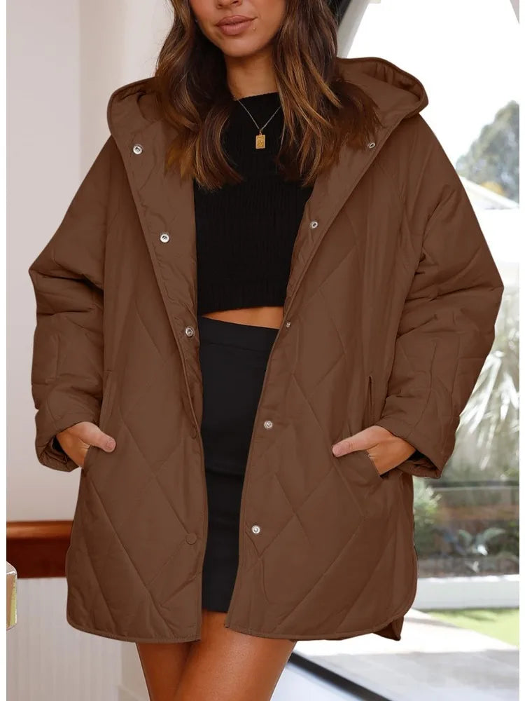 Corvaya™ – oversize-talvitakki hupulla