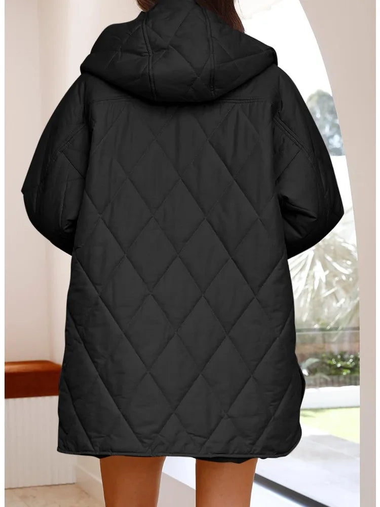 Corvaya™ – oversize-talvitakki hupulla