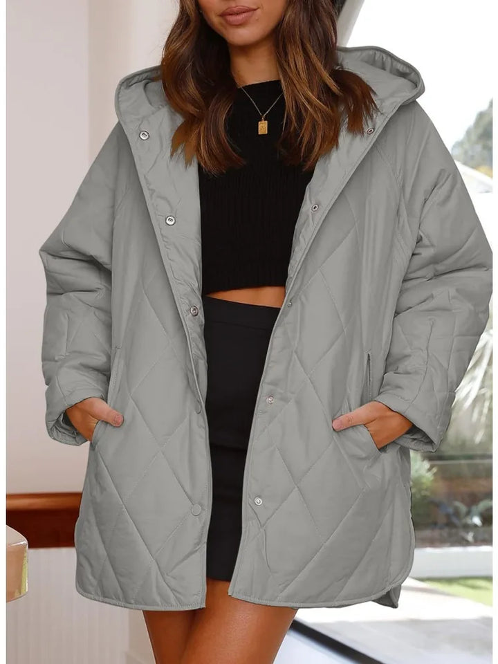 Corvaya™ – oversize-talvitakki hupulla
