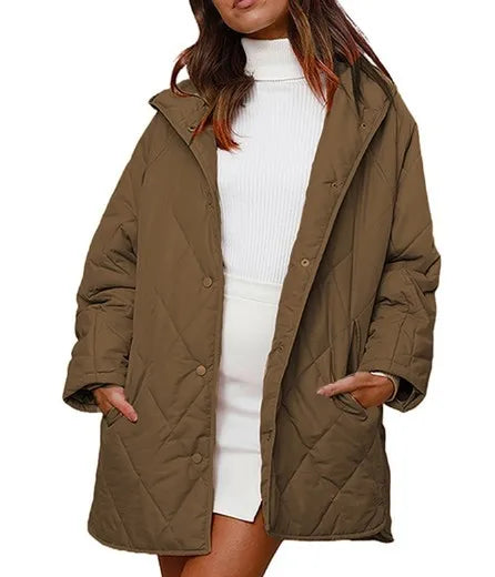 Corvaya™ – oversize-talvitakki hupulla